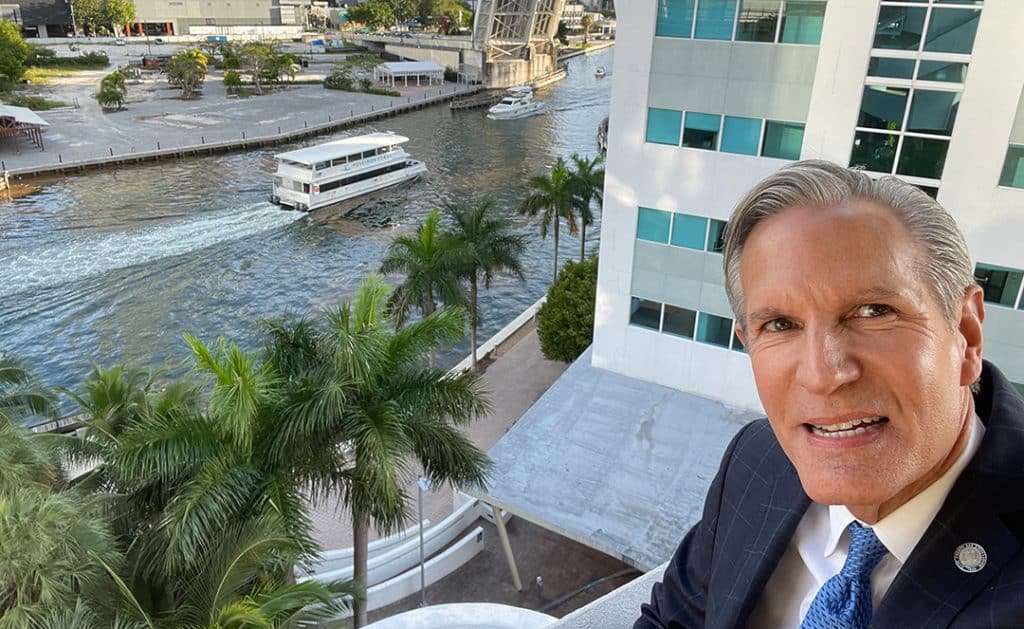 Selfie of John H. (Jack) Hickey while at Metromover station overlooking the Miami River and Brickell City Center